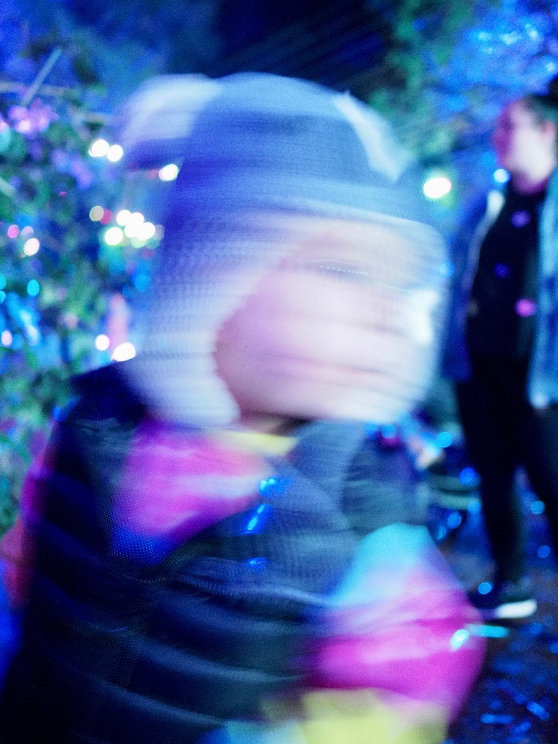 Blurred child moving, captured with slow shutter speed