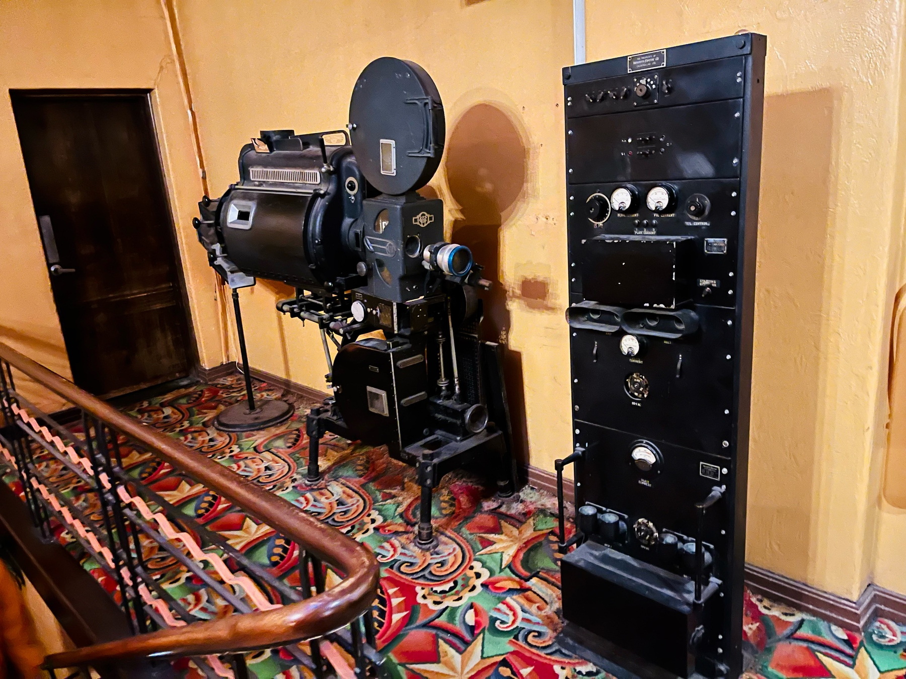 A classic black film camera and equipment